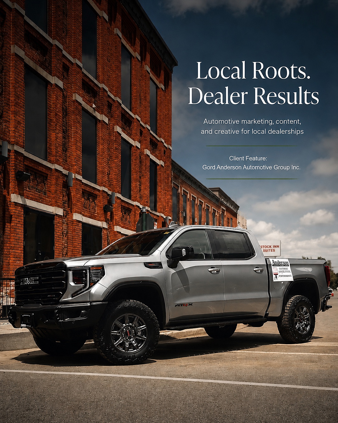 Automotive campaign artwork featuring a pickup beside a brick building